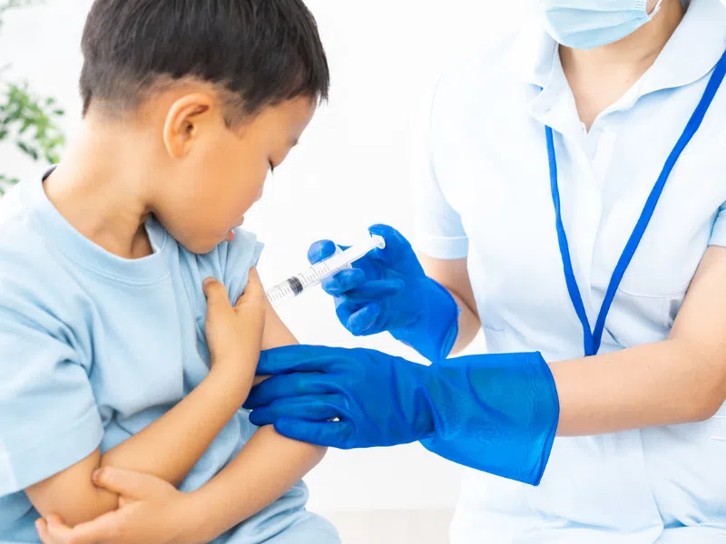 Child receiving vaccination - children vaccination services Belconnen