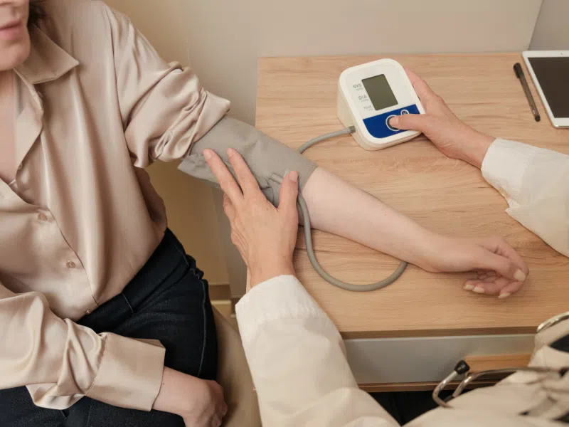 Blood pressure check during consultation at Belconnen General Practice