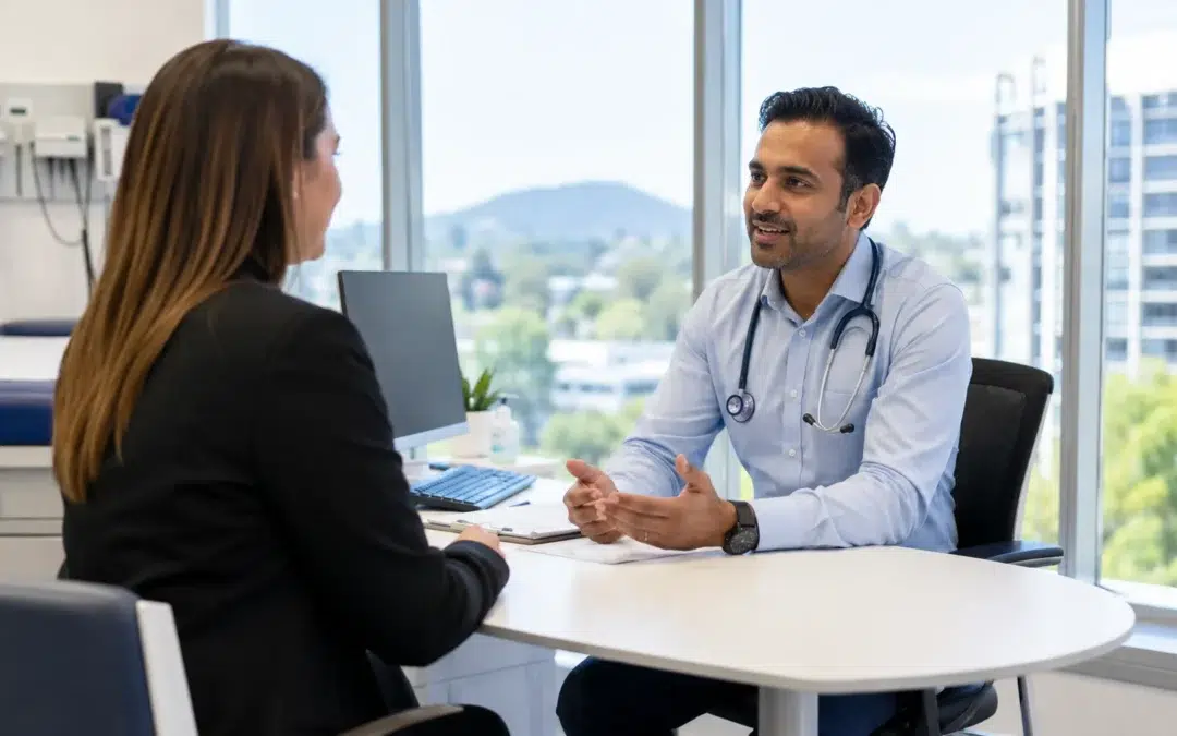 Employee attending a workplace health consultation with a GP at a modern medical clinic in Belconnen.